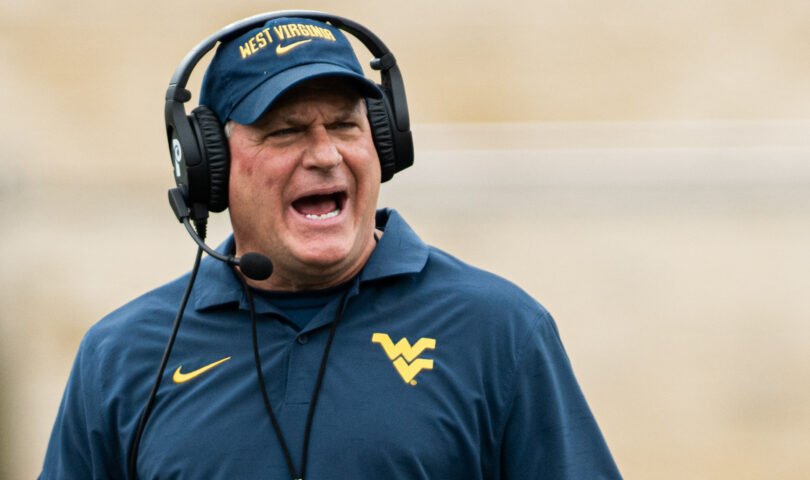 An emotional wave of admiration has swept through Morgantown after the West Virginia University football coach made an astonishing act of kindness that has touched hearts far beyond the game. In an inspiring gesture of compassion, he donated $5 million to aid struggling families, students, and community members across the state of West Virginia.