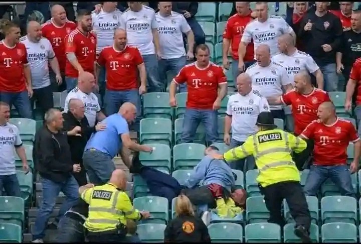 Ein Abend, der als intensives, aber sportlich geprägtes Duell zwischen Bayern München und Real Madrid in der Allianz Arena geplant war, verwandelte sich in ein erschütterndes Szenario voller Chaos, Emotionen und wachsender Kontroversen, als die ohnehin angespannte Rivalität der Fangruppen eskalierte und die Situation auf den Tribünen außer Kontrolle geriet, wodurch Sicherheitsbedenken, hitzige Debatten und ein Schatten über das eigentliche Fußballereignis entstanden, der noch lange nach Abpfiff nachhallen dürfte.